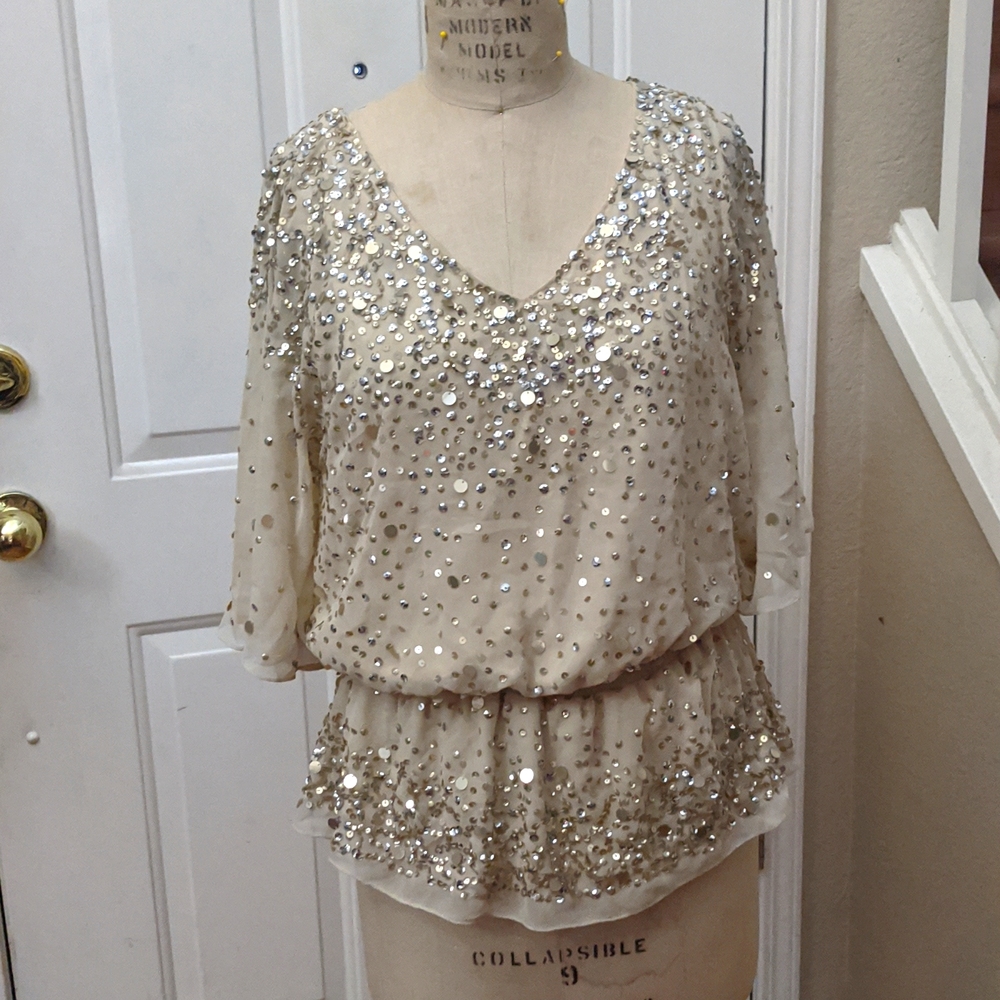 Champagne colored sequined blouse